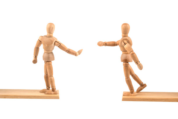 istock Wooden mannequin not interest to overcome conflicts and borders 829469800