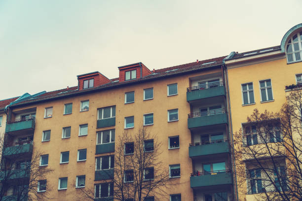 istock vintage colored orange apartment houses 829471942