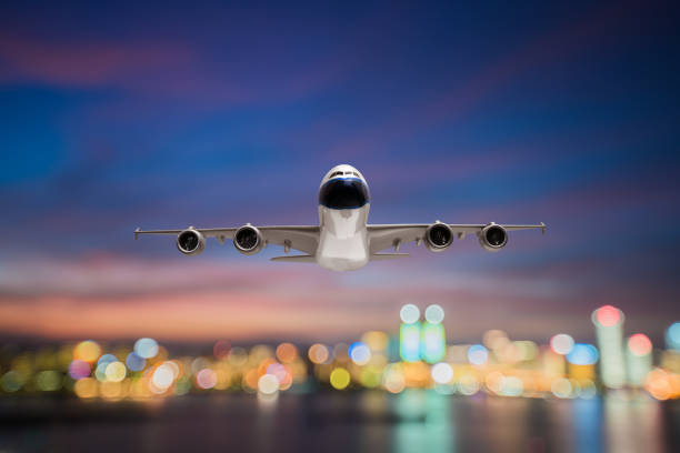 istock Low angle view of jet airliner taking off 829474834