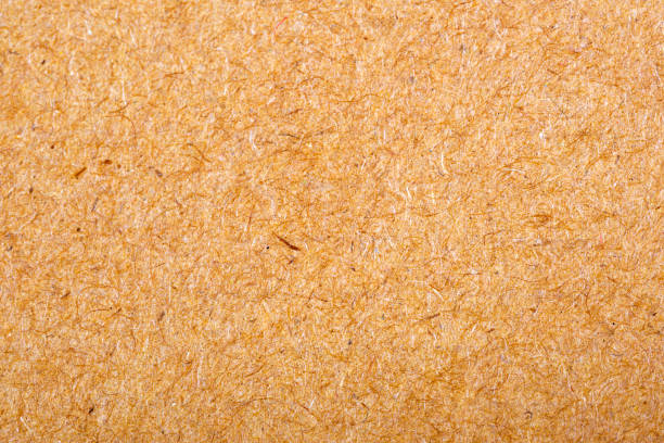 istock closeup of yellow cardboard 829483236