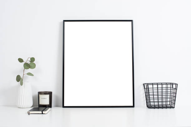 istock white office interior, stylish work table space with poster artw 829489666