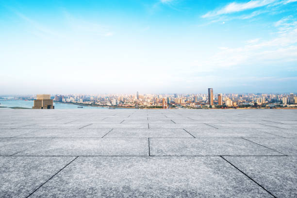 istock Panoramic skyline and buildings with empty concrete square floor 829490240
