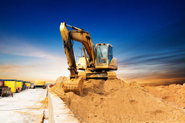Large excavator on a field stock photo