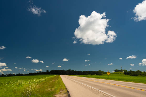 istock Road on a field in Illinois country side 829505196
