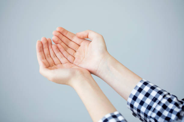 istock Cupped hands of young woman 829506684