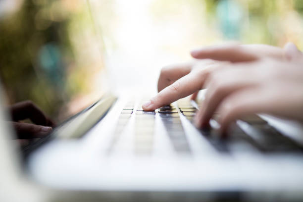 Cute girl working at laptop
