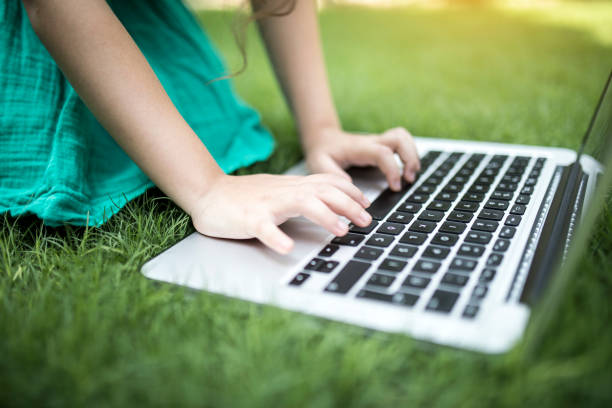 istock Cute Fingers On Laptop 829528968