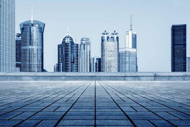 empty marble floor with cityscape and skyline in cloud sky