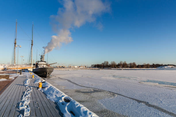 istock Helsinki winter, ships and ice, embankment 829546866