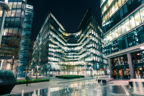 istock Modern architecture at night on Riverbank in London 829563914