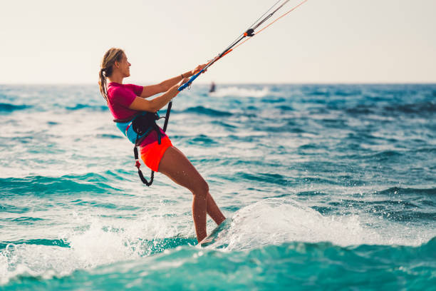 istock Kite Boarding Woman in the Caribbean 829567396