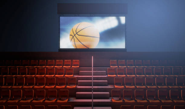 Sports Stadium Scoreboard An illuminated stadium big screen showing a basketball replay in the stands in the night time - 3D render scoreboard stadium sport seat stock pictures, royalty-free photos & images