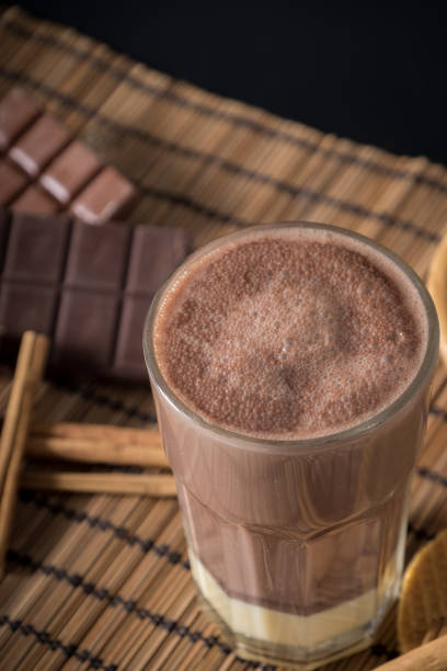 istock Delicious hot chocolate in a glass with cinnamon 829584012