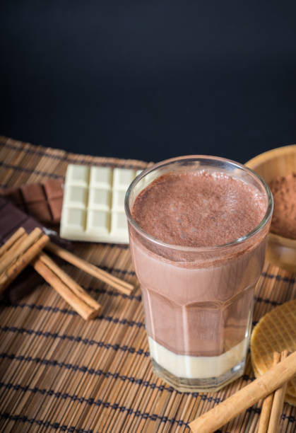istock Delicious hot chocolate in a glass with cinnamon 829584276