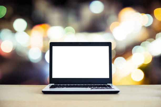 istock Laptop with bokeh city 829589702