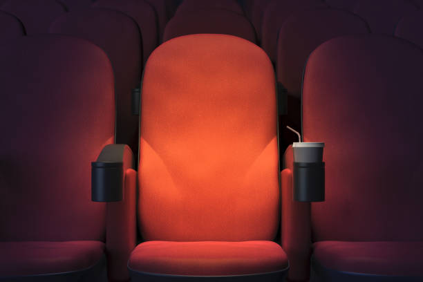 Emoty cinema armchair Close up of empty red cinema or theater armchair. Mock up, 3D Rendering seat stock pictures, royalty-free photos & images