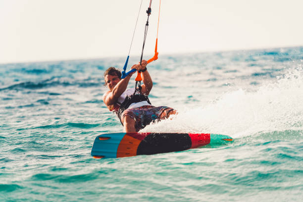 istock Kite Surfing Man In The Caribbean 829597460