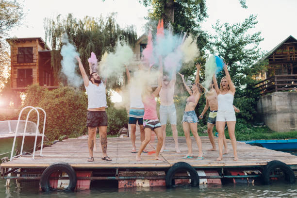 istock Friends On Summer Party With Holi Colors 829598926