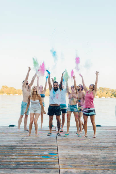 istock Friends On Summer Party With Holi Colors 829599200