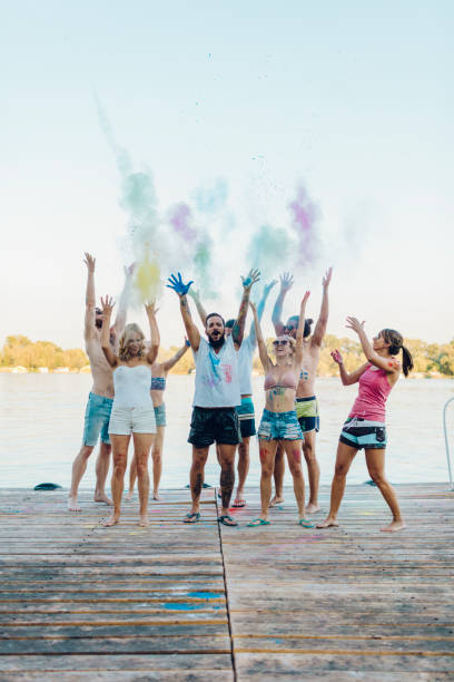 istock Friends On Summer Party With Holi Colors 829599440