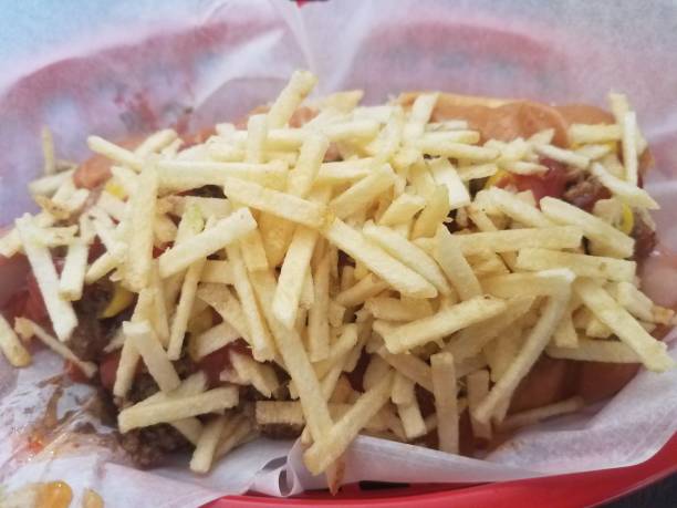 istock hot dog in basket with beef and fries 829606522