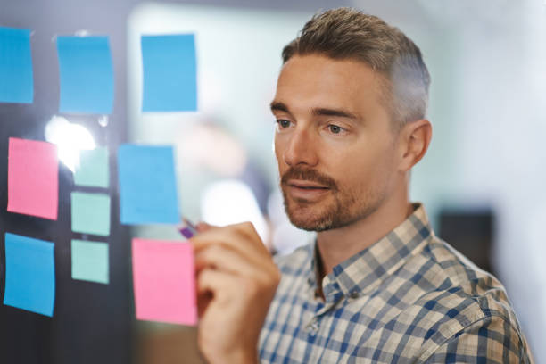 istock He looks closely to spot any mistakes 829617396