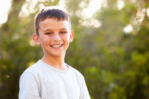 istock Portrait of a smiling white boy looking to camera 829618606