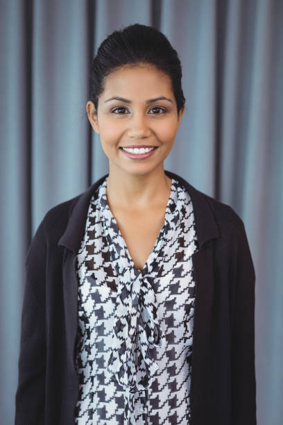 istock Portrait of smiling executive 829639886