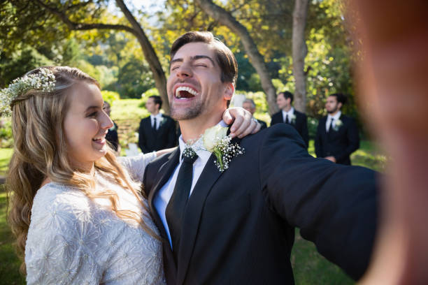 istock Happy couple having fun in park 829668030