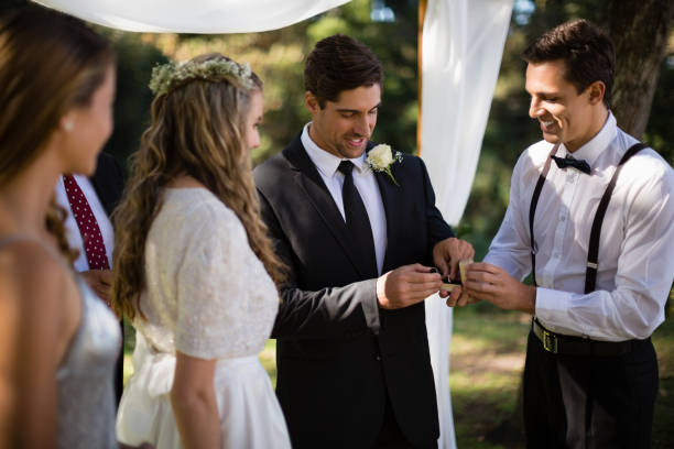 istock Waiter giving engagement ring to groom 829669948