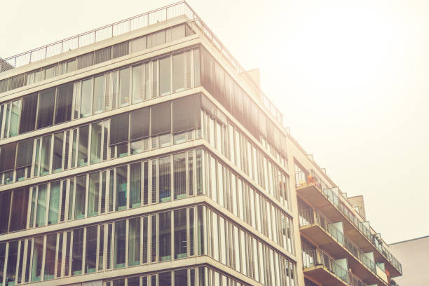 istock glass facaded office building in sunlight 829685550