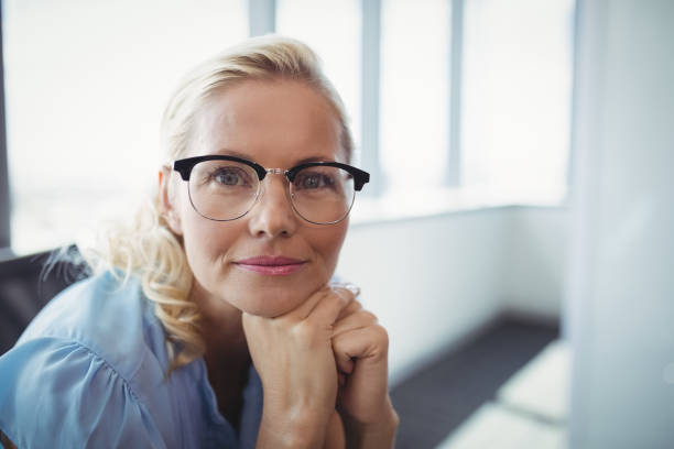 istock Portrait of smiling executive 829692586