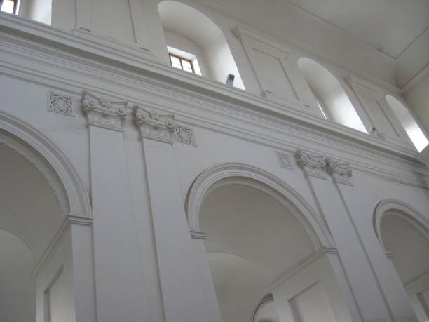 istock White wall of an architectural ensemble in Catholic church 829692892