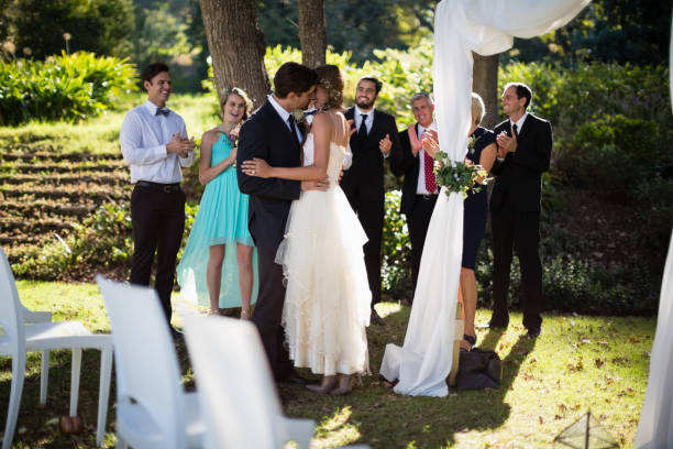istock Affectionate couple kissing each other in park 829714550