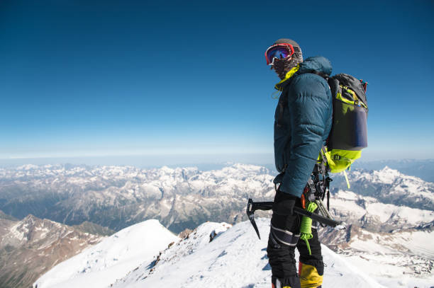 istock Professional guide - climber on the snow-covered summit of Elbrus sleeping volcano 829719200