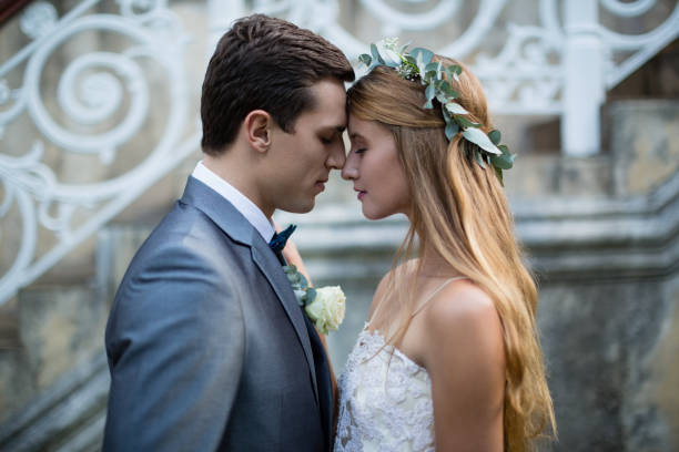 istock Wedding couple standing face to face 829731984