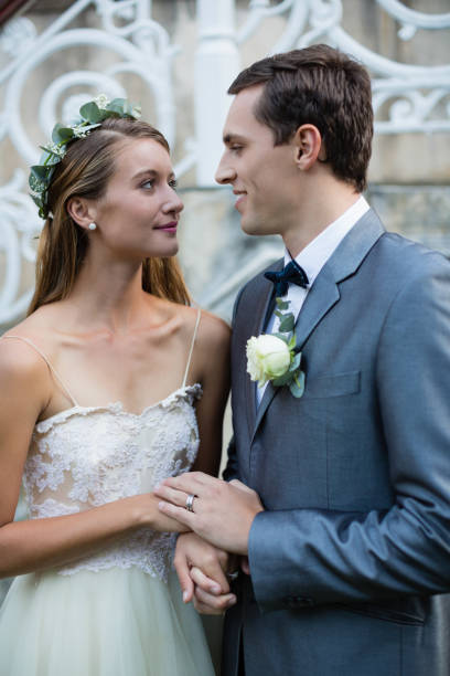 istock Wedding couple standing face to face 829734720