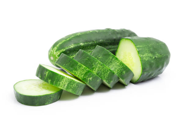 istock Sliced cucumber isolated on white background 829736882