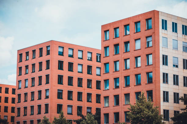 istock orange office row houses with brick facade 829741620