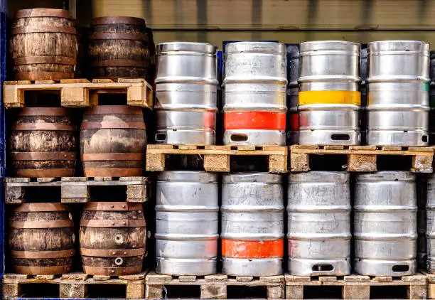 new and old beer barrels