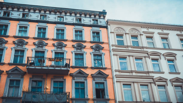 istock orange and white facaded buildings 829750226