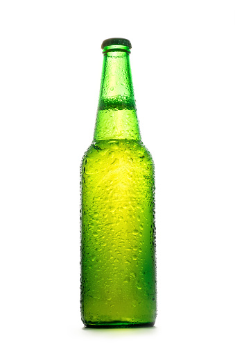 Green light beer bottle with water drops. Isolated on white
