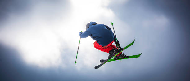 istock Male skier jumping in mid air 829762378
