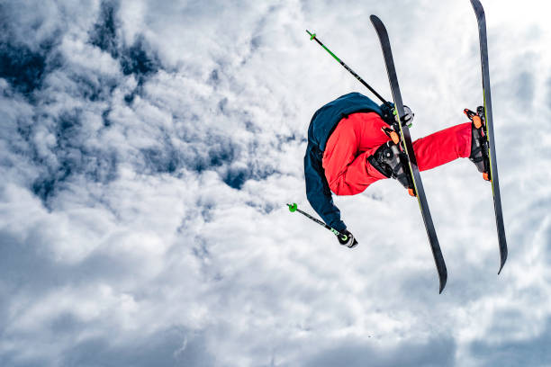 istock Male skier jumping in mid air 829762380