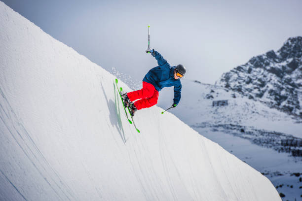 istock Male snowboarder in half pipe 829762394