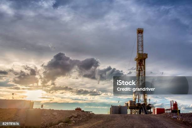 Fracking Drilling Rig At The Golden Hour Stock Photo - Download Image Now - Crude Oil, Drilling Rig, Fracking