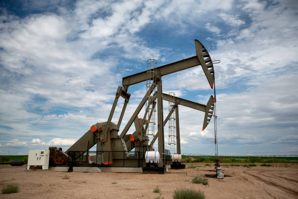 istock Fracking Pumpjacks in the Oil Field 829782338