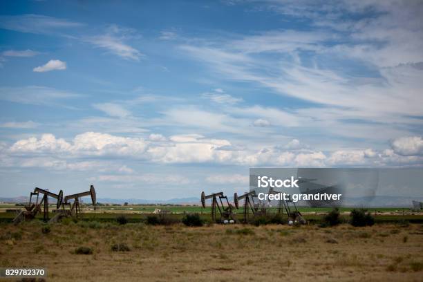 Fracking Pumpjacks In The Oil Field Stock Photo - Download Image Now - Landscape - Scenery, Texas, Crude Oil