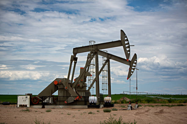 istock Fracking Pumpjacks in the Oil Field 829782380