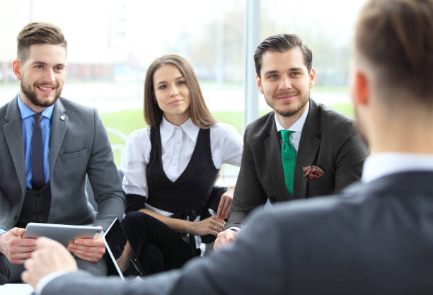 istock Business team discussing together business plans in office 829785910